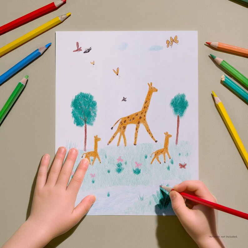 May include: A child's drawing of giraffes in a grassy field with trees and butterflies. The drawing is being colored with a red colored pencil. Various colored pencils, including red, yellow, blue, and green, are scattered around the drawing.