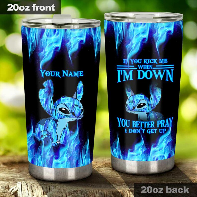 May include: Two 20oz stainless steel tumblers with a blue flame design and a cartoon character. One tumbler says "YOUR NAME" and features the character. The other says "IF YOU KICK ME WHEN I'M DOWN YOU BETTER PRAY I DON'T GET UP."