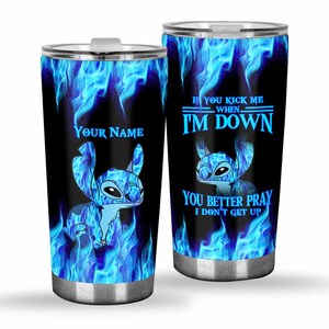 May include: Two stainless steel tumblers with a blue flame design and a cartoon character. One tumbler has the text "Your Name", the other says "If you kick me when I'm down, you better pray I don't get up."