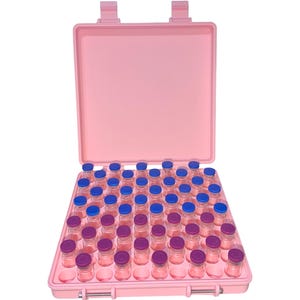 May include: A pink carrying case, open to reveal rows of small glass vials. The vials have either blue or purple caps. The case is designed to hold the vials securely. The case has a handle and latches.