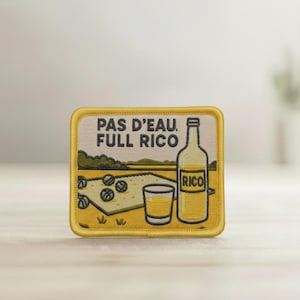 Toppa in velcro "Niente acqua, Rico pieno". Perfetta per un aperitivo a tema pétanque. Toppa tessuta con retro in velcro per cappellini o sacchetti.