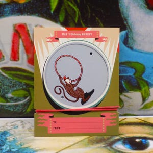 Spinner mágico con temática de artistas de circo, monos y perros