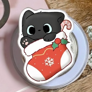 Soporte magnético para teléfono con forma de gato en calcetín navideño: bonito soporte para teléfono MagSafe con forma de gato, accesorio para teléfono navideño, regalo navideño para amantes de las mascotas, accesorio acogedor para teléfono.
