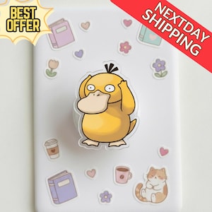 May include: A white phone case decorated with cartoon stickers, including a yellow duck, books, flowers, hearts, a coffee cup, and a cat. The case has a pop socket with the duck design. The words "BEST OFFER" and "NEXTDAY SHIPPING" are also visible.
