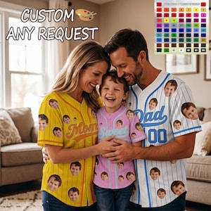 May include: Three baseball jerseys, yellow, pink, and white, each adorned with a repeating face pattern. The yellow jersey says "Mom", the pink jersey says "Sweet", and the white jersey says "Dad". The text "CUSTOM ANY REQUEST" is at the top.