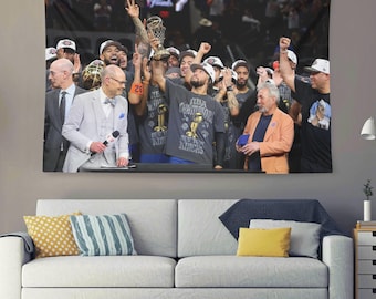 Jalen Brunson Lifts NBA Finals Trophy Flag