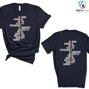 May include: Navy blue t-shirt with a list of names in white, with some letters in red, green, yellow, and black. The names include Obama, Kamala, Maya, Stacey, Frederick, Thurgood, Michelle, Rosa, Martin, Malcolm, Harriet, and Garvey.