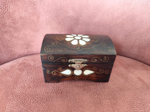 Handcrafted Ottoman-style wooden chest with genuine mother-of-pearl inlay and brass detailing — the kind of heirloom-looking box you'd find in a bazaar, not a big-box store.
