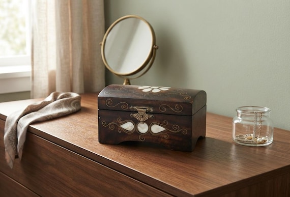 Handcrafted Ottoman-style wooden chest with genuine mother-of-pearl inlay and brass detailing — the kind of heirloom-looking box you'd find in a bazaar, not a big-box store.