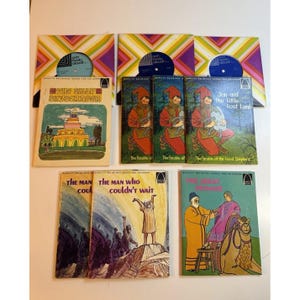 May include: A collection of vintage children's books and records. The books feature colorful illustrations and titles like "The Silly Skyscraper" and "Jon and the Little Lost Lamb." The records are in patterned sleeves with the "arch books cloudt" logo.