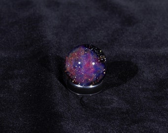 Loose Red Nebula in a Star Cluster Space Glass Marble