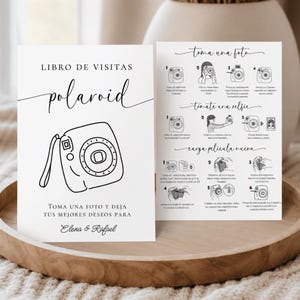 Könnte beinhalten: Zwei weiße rechteckige Anleitungskarten mit schwarzem Text und Strichzeichnungen. Die linke Karte zeigt ein Kamerasymbol und den Text LIBRO DE VISITAS polaroid TOMA UNA FOTO Y DEJA TUS MEJORES DESEOS PARA Elena & Rafael. Die rechte Karte zeigt Schritte.