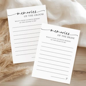 May include: Two white cards with black text. One card reads "memories of the groom" and asks "What's your favorite memory of the groom-to-be?" The other card reads "memories of the bride" and asks "What's your favorite memory of the bride-to-be?"