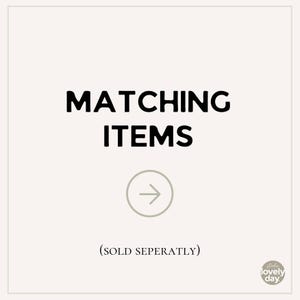 May include: A square image with the words "MATCHING ITEMS" in bold black font. Below the text is a gray circle with an arrow pointing to the right. The text "(SOLD SEPERATLY)" is below the circle. The background is a light beige color.