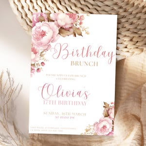May include: A white invitation card with pink floral accents and the text "Birthday Brunch" in elegant script. The card also includes the text "Olivia's 17th Birthday" and event details. Floral elements frame the text.