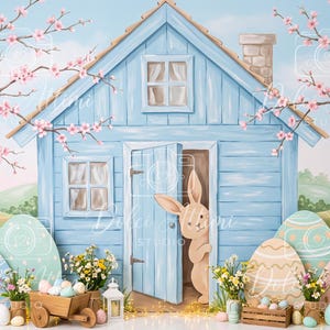 May include: A light blue wooden house backdrop featuring a partially open door with a tan rabbit peeking out. The scene includes large decorative Easter eggs, flowering cherry blossom trees, a wooden cart, and small flower arrangements.
