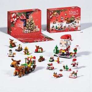 May include: A red Christmas advent calendar box with a festive design, open to reveal a miniature Christmas tree and gifts. Scattered around are various small, colorful brick-built Christmas figures, including Santa Claus, reindeer, and a snowman. The box reads "Merry Christmas".