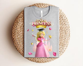 Senior Princess Class of 2026 Graduation T-shirt, Princess Peach Style Graphic with Cap and Diploma, Columbia Blue Gamer Fan Gift Tee