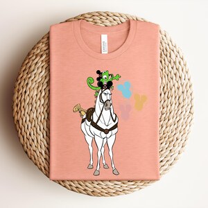 May include: A rustic wooden sign with the text "Welcome to our home" in white lettering. The sign features a distressed finish and a simple, inviting design, perfect for a front porch or entryway.