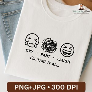 Peut inclure: T-shirt blanc avec un motif noir de trois visages d'émojis : pleurant, enchevêtré et riant. Le texte en dessous dit "CRY • RANT • LAUGH I'LL TAKE IT ALL." Le t-shirt est présenté sur un jean bleu.