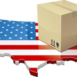 May include: A cardboard box with shipping symbols sits atop a 3D rendering of the United States map, which is colored with the American flag. The image suggests domestic shipping and e-commerce.