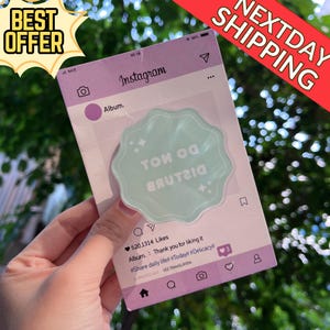 May include: A light purple Instagram-themed card with a light green, scalloped-edge sticker that reads "DO NOT DISTURB" in reverse. The card has a "BEST OFFER" and "NEXTDAY SHIPPING" banner.