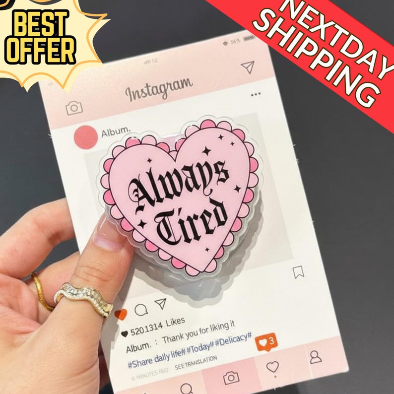 May include: A pink heart-shaped sticker with the words "Always Tired" in black gothic font. The sticker is on a mock Instagram post with a pink background. The image also includes the text "Best Offer" and "Next Day Shipping".