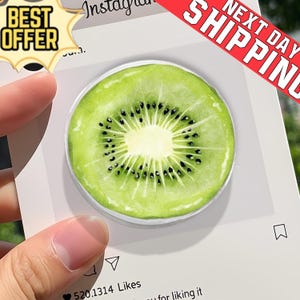 May include: A round, green kiwi fruit design on a white background. The kiwi has a light green outer ring, a white center, and black seeds. The image is on a white card with social media icons and the text "BEST OFFER" and "NEXT DAY SHIPPING".