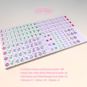 May include: A complete set of 160 Mahjong tiles. The tiles are white with various colorful symbols, including flowers, plants, and Chinese characters. The text "160 Tiles" is displayed in pink. The set includes 1-9 Bams, Cracks, and Dots, North, East, West, South Winds, Red, Green, and White Dragons, Flowers, Jokers, and Blanks.