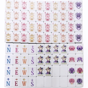 May include: A full set of white Mahjong tiles. The tiles are decorated with diverse symbols, numbers, and characters in colours such as red, orange, and purple. Some tiles display the word "NEWS" and the word "JOKER".