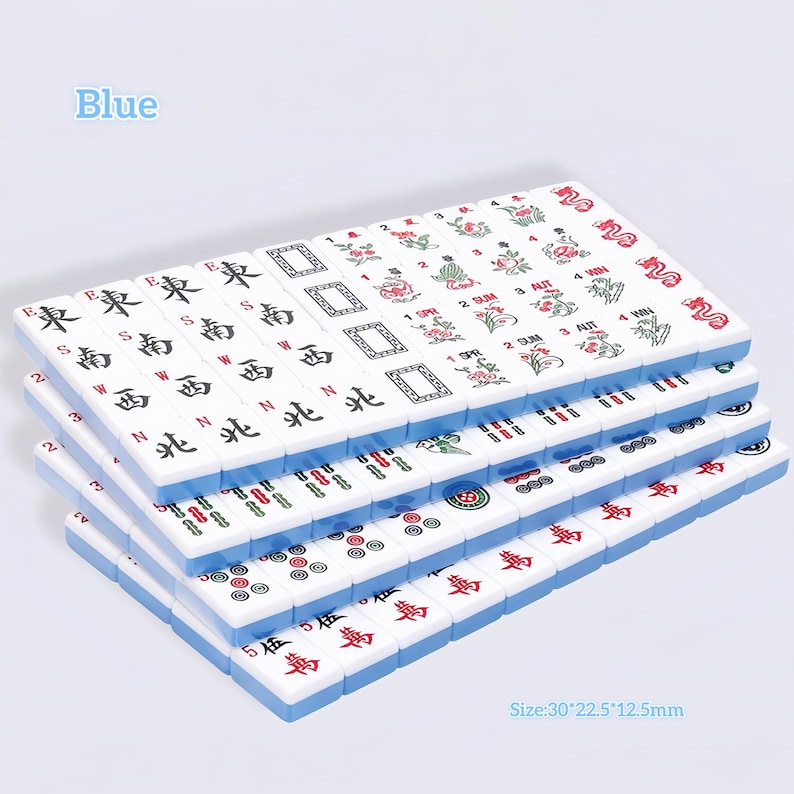 May include: A set of rectangular mahjong tiles with blue backs, featuring various engraved symbols, Chinese characters, and floral designs in red, green, and black. The tiles are stacked in rows, and the text Size:30*22.5*12.5mm is printed on the image.