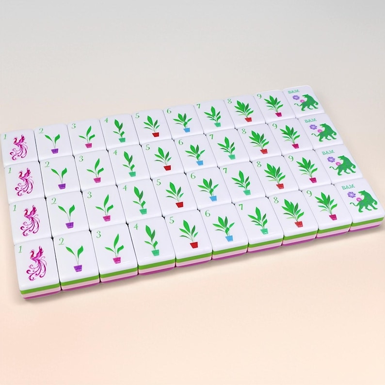 May include: A set of white Mahjong tiles with green, purple, and red plant illustrations and numbers. The tiles are arranged in a rectangular pattern. Some tiles have the word "BAM" and a green illustration of a dragon.
