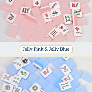 May include: A collection of translucent jelly pink and jelly blue mahjong tiles. The tiles feature white faces with various red, green, and black engraved symbols, numbers, and characters. The text Jelly Pink & Jelly Blue is centered between the two groups.