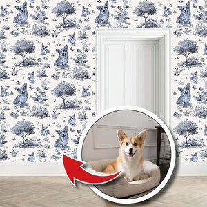 May include: A cream-colored wall with a repeating pattern of blue corgi dogs, trees, and butterflies. A circular inset shows a corgi dog in a beige dog bed. The dog is tan and white with its tongue out.
