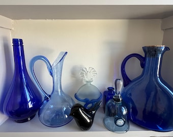 A selection of blue glass from the mid century