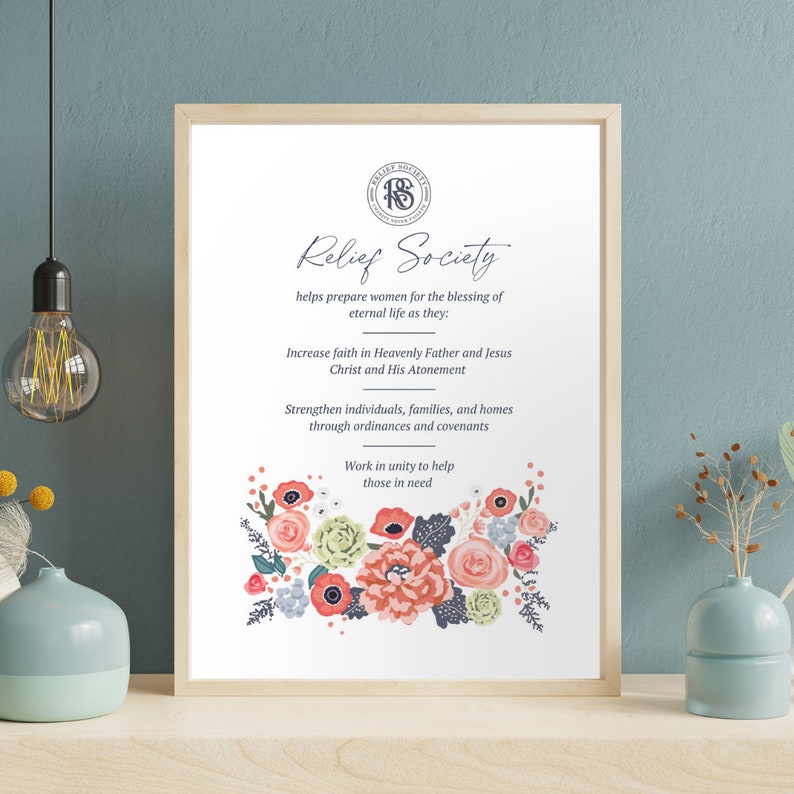 May include: A white printable poster with a floral design at the bottom. The poster features the text "Relief Society" and a description of the organization's purpose.