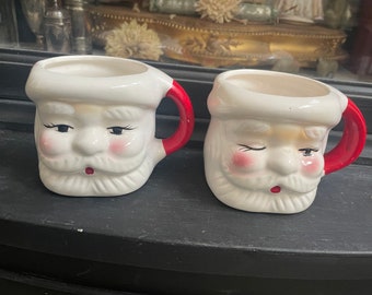 Set of TWO Vintage Smiling and Winking Santa Head Mugs