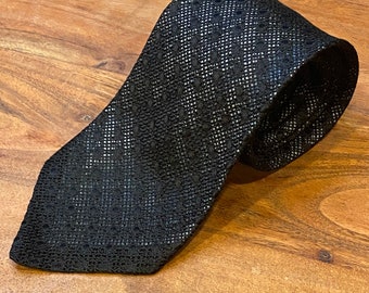 Vintage Cerruti CXII Black Silk Knit Grenadine tie 55 inches length and 3 inches wide Illusions style with silver blue lining