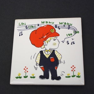 Vintage &#39;Uki Uki Waso Waso Iso Iso&#39; Whistling Blonde Boy Ceramic Square Tile (E1529)
