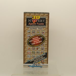 May include: A brown box with a 3D jigsaw puzzle of a building called "Testimony Tower". The box has the text "Solve the puzzle to solve the crime!" and "Catch a killer in this electrifying murder mystery!"