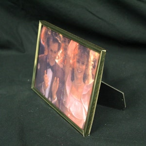 Vintage 5"x7" Gold-tone Frame with Footloose (V4935)