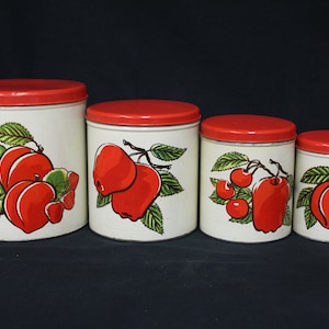 Vintage Metal Canister Set With Fruit Design and Red Lids Set Of Four (V3302)