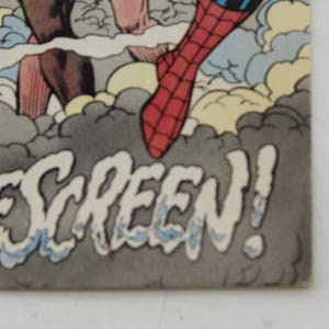 May include: Comic book panel featuring Spider-Man's red and blue costume, with the word "OKESCREEN!" in a stylized font. The artwork includes gray and white clouds, and other figures are partially visible.