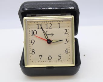 Vintage Equity Travel Alarm Clock Plastic Case Works (S4507)