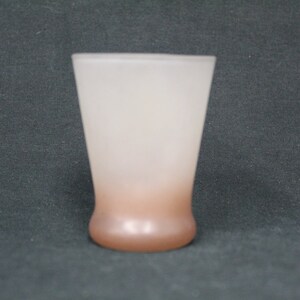 May include: A frosted glass tumbler with a brown ombre effect at the bottom. The glass is clear at the top and gradually transitions to a darker brown colour at the base.