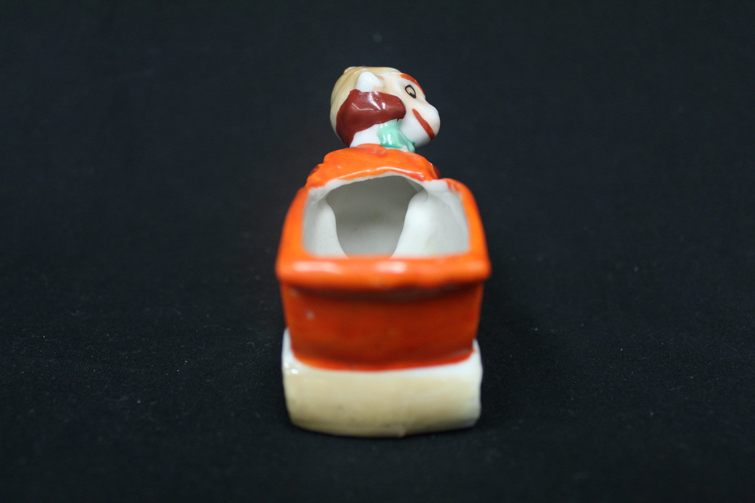 Vintage Smiling Dwarf Miner Man Japan Ceramic Boy Pushing Orange