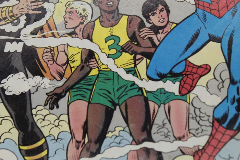 May include: Comic book panel featuring several figures in action. One figure wears a yellow tank top with a green number 3, green shorts, and is embraced by others. A superhero in blue and red is also present.