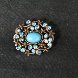 Vintage Brooch with Turquoise Colored Center Stone and Small Rhinestones (V3941)
