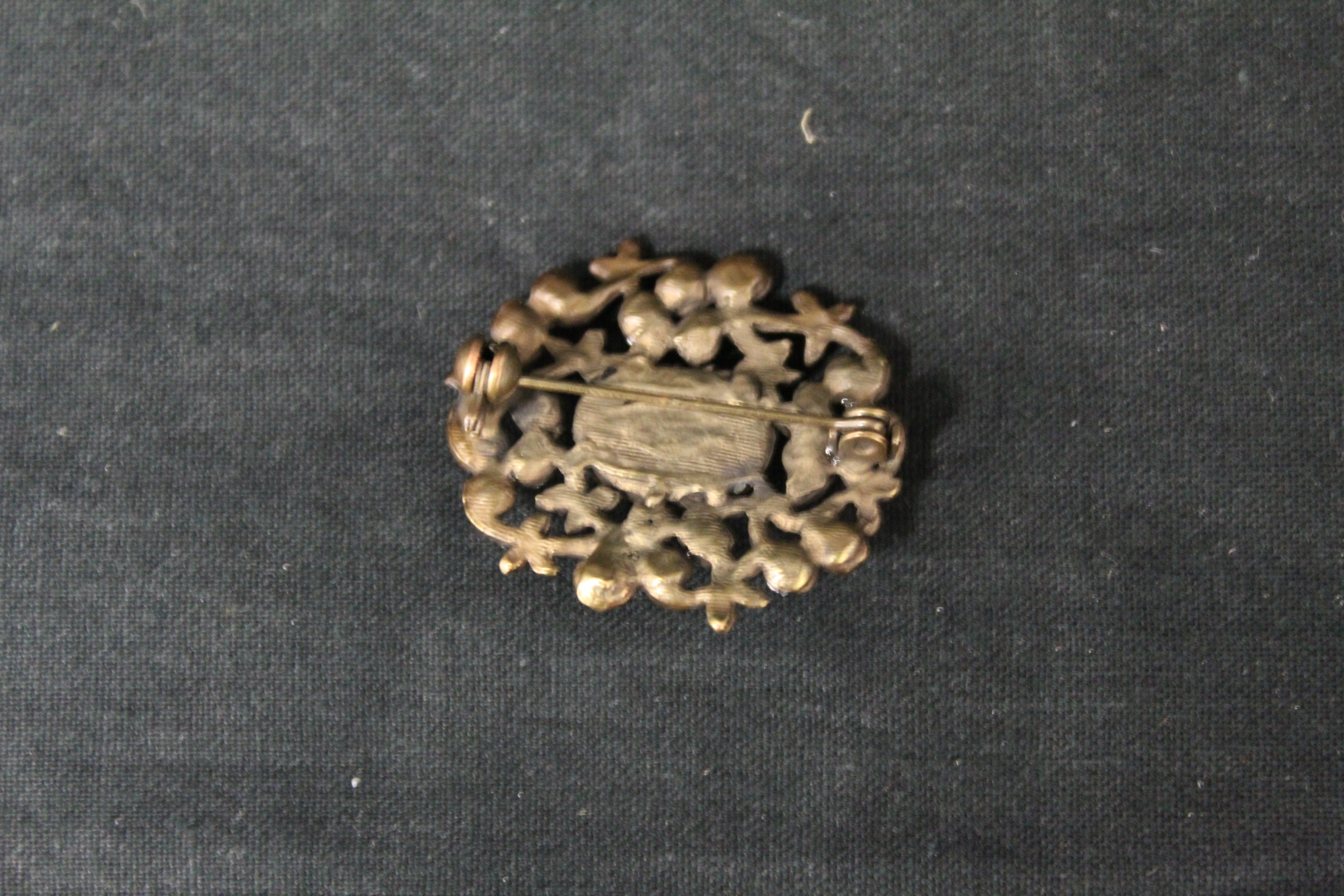 Vintage Brooch with Turquoise Colored Center Stone and Small Vintage Brooch with Turquoise Colored Center Stone and Small