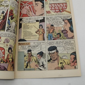 May include: A vintage comic book page with colorful illustrations. Panels depict scenes with characters, speech bubbles, and text. One panel shows a diagram of the respiratory system. The comic book is open, revealing multiple panels and text.